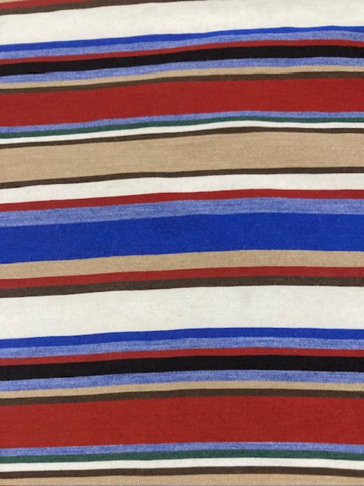 Blue/Red/Coffee Woven Cotton lightweight Stripe. Stripes run across the fabric.
