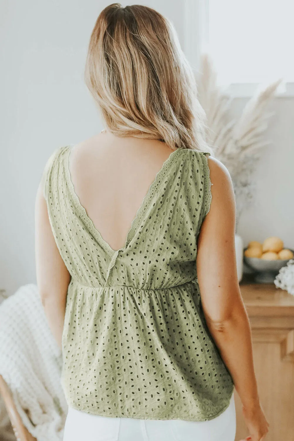Green Sleeveless Eyelet Peplum Top